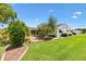 Well-maintained single-story home with verdant lawn and mature landscaping at 9853 Se 175Th Pl, Summerfield, FL 34491