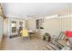 Bright and airy sunroom, with lots of windows, perfect for enjoying outdoor views at 9853 Se 175Th Pl, Summerfield, FL 34491