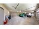 Detached three-car garage is used to store lawn maintenance equipment and trailers at 10528 Sw 27Th Ave, Ocala, FL 34476