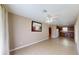 Open concept living space with views of the kitchen and dining area, featuring tile flooring at 10528 Sw 27Th Ave, Ocala, FL 34476
