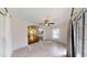 Bright sun room with tiled floors leading to an open-concept living area at 10528 Sw 27Th Ave, Ocala, FL 34476