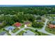 Neighborhood aerial view of the homes shows mature trees and sidewalks along the roads at 11586 Sw 75Th Cir, Ocala, FL 34476