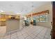 Bright Florida room with vaulted ceilings and tile floors at 11586 Sw 75Th Cir, Ocala, FL 34476