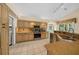 Well-appointed kitchen with stainless appliances, granite countertops, and tile flooring at 11586 Sw 75Th Cir, Ocala, FL 34476