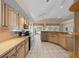 Kitchen featuring stainless appliances, granite countertops, and tile flooring at 11586 Sw 75Th Cir, Ocala, FL 34476