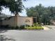 Welcome to The Villages of Silver Lake entrance, with lush landscaping and a charming sign at 1408 Torrey Pines Dr, Lady Lake, FL 32159