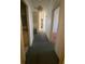 Hallway leading to bedrooms and bathrooms at 1408 Torrey Pines Dr, Lady Lake, FL 32159