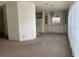 Spacious living area open to dining, featuring modern lighting at 1408 Torrey Pines Dr, Lady Lake, FL 32159