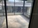 Enclosed patio area, great for relaxing or entertaining outdoors at 1408 Torrey Pines Dr, Lady Lake, FL 32159