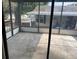 Spacious screened patio providing an outdoor living area to relax and entertain at 1408 Torrey Pines Dr, Lady Lake, FL 32159