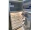 View of refrigerator with open doors at 1408 Torrey Pines Dr, Lady Lake, FL 32159