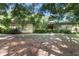Charming single-story brick home with large yard, trees, and traditional architecture at 16120 Nw Us Highway 27, Williston, FL 32696