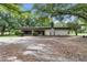 This home has a long driveway at 16120 Nw Us Highway 27, Williston, FL 32696