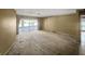 Spacious living room with large sliding glass doors that open to screened patio at 16120 Nw Us Highway 27, Williston, FL 32696