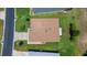 Overhead shot of a house with a well-manicured lawn, landscaping, and a clean roof at 16193 Sw 14Th Avenue Rd, Ocala, FL 34473