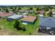 Aerial view of a home with a well-maintained lawn and landscaping in the backyard at 16193 Sw 14Th Avenue Rd, Ocala, FL 34473