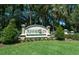 Welcoming community sign for SummerGlen Golf Club Living, surrounded by lush landscaping and mature trees at 16193 Sw 14Th Avenue Rd, Ocala, FL 34473