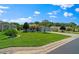 Landscaped front yard view of a charming home and well-maintained green lawn at 16193 Sw 14Th Avenue Rd, Ocala, FL 34473