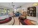 Bright living room with multiple seating options, open to the kitchen and lanai at 16193 Sw 14Th Avenue Rd, Ocala, FL 34473