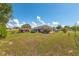 Spacious backyard with storage shed and ample room for outdoor activities at 21 Pine Trace Run, Ocala, FL 34472