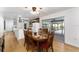 The dining room features a table and chairs with access to the pool area and kitchen at 2146 Ne 9Th St, Ocala, FL 34470