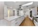 Spacious kitchen with stainless steel appliances, range hood, and ample countertop space at 2146 Ne 9Th St, Ocala, FL 34470