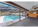A view of the pool and patio, seamlessly blending indoor and outdoor living spaces at 2146 Ne 9Th St, Ocala, FL 34470
