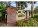 Lake View Village sign with brick pillars and lush greenery, community entrance at 2631 Sw 20Th Cir, Ocala, FL 34471