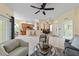 Spacious living room with tile flooring, breakfast bar, and access to dining at 2631 Sw 20Th Cir, Ocala, FL 34471