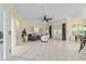 Spacious living room features tile floors, neutral paint, and lots of natural light at 2631 Sw 20Th Cir, Ocala, FL 34471