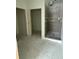Incomplete bathroom featuring shower base and open doorway, ready for personalization at 415 Se 1St Ave # 103-B, Ocala, FL 34471