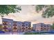 Modern apartments featuring brick accents, balconies, and ample parking, under a soft, inviting sky at 415 Se 1St Ave # 103-B, Ocala, FL 34471