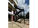 Exterior metal staircase installed on new building against a background of construction materials and sky at 415 Se 1St Ave # 103-B, Ocala, FL 34471