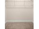Walk-in closet with wire shelving and carpeted floor at 465 Ne 155Th Street Rd, Citra, FL 32113