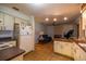 Kitchen and open concept living area with laminate floors at 465 Ne 155Th Street Rd, Citra, FL 32113
