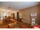 Open floor plan featuring carpeted floors and vintage-style wallpaper at 465 Ne 155Th Street Rd, Citra, FL 32113