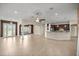 A shot of a living space featuring hardwood floors and dark wood cabinetry in the kitchen at 465 Ne 155Th Street Rd, Citra, FL 32113