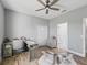 Spacious office features stylish furniture, wood-look flooring and a hide rug at 5330 Ne 111Th Lane Rd, Anthony, FL 32617