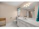 Bathroom featuring a vanity with sink and toilet at 5661 Nw 96Th Ln, Ocala, FL 34482