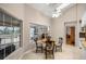 Cozy breakfast nook bathed in natural light, features a round wooden table with seating for four at 5661 Nw 96Th Ln, Ocala, FL 34482