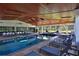 Beautiful indoor pool and spa area with ample seating, perfect for relaxation and entertainment at 6160 W Highway 326, Ocala, FL 34482