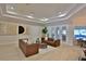 Bright living room featuring stylish seating arrangements, natural light, and modern decor at 6160 W Highway 326, Ocala, FL 34482