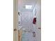 Hall bathroom features a shower-tub combo, vanity with storage, and a skylight to brighten the space at 6211 Se 126Th St, Belleview, FL 34420
