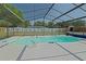 Large screened-in pool provides a refreshing escape, enhanced by a spacious deck and covered lounging at 6211 Se 126Th St, Belleview, FL 34420