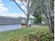 View of the backyard featuring a large shed providing ample storage and workshop space at 70 Almond Pass Dr, Ocala, FL 34472