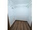 Spacious walk-in closet features hardwood floors and wire shelving for optimal storage space at 70 Almond Pass Dr, Ocala, FL 34472