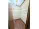 Walk-in closet with shelving and wood laminate flooring at 70 Almond Pass Dr, Ocala, FL 34472