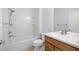 Bathroom featuring a shower-tub combo, a toilet, and a vanity with sink and mirror at 7270 Sw 99Th Cir, Ocala, FL 34481
