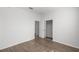 Bedroom features wood flooring and closet at 7270 Sw 99Th Cir, Ocala, FL 34481