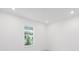 Bright, empty bedroom with recessed lighting and a window view at 7536 Sw 60Th St, Ocala, FL 34476
